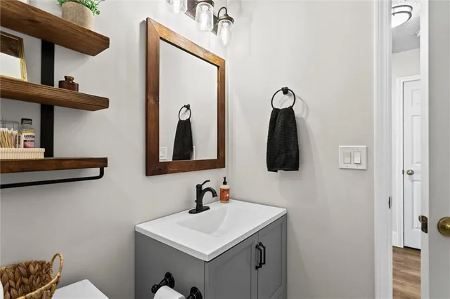 a large kitchen with stainless steel appliances granite countertop a stove and a sink