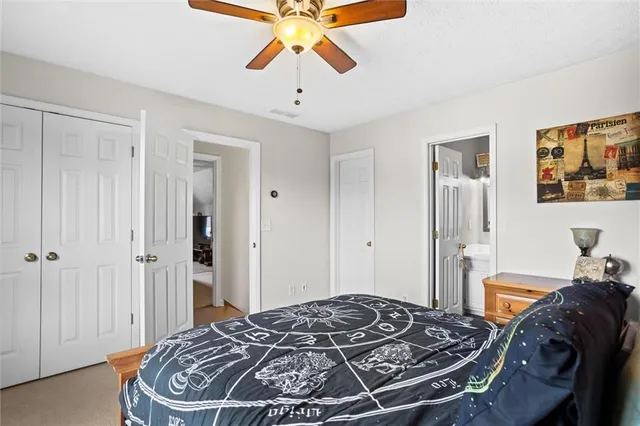 a view of kitchen with a stove wooden floor and a window
