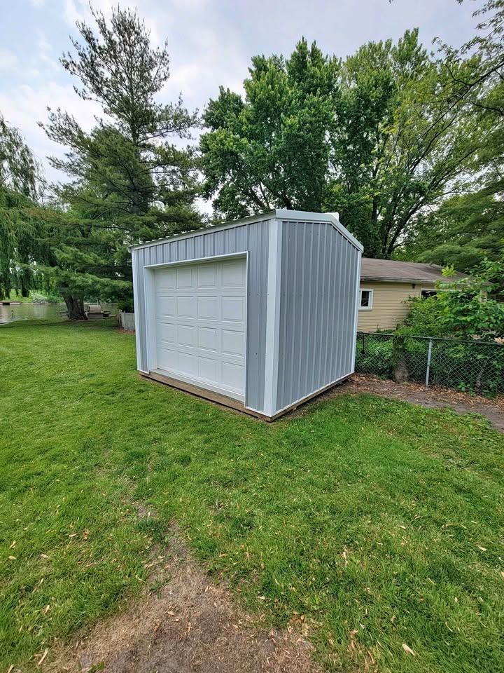 5065 Browns Beach Road Rockford, IL 61103 - Photo 7 of 13 a backyard of a house with lots of green space