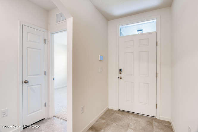 1552 Saxton Road Cocoa, FL 32926 - Photo 2 of 35 ARIA-small-002-001-Foyer-666x445-72dpi