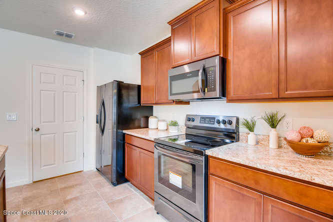 1552 Saxton Road Cocoa, FL 32926 - Photo 3 of 35 ARIA-small-004-004-Kitchen-666x445-72dpi