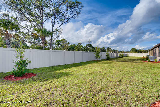 1552 Saxton Road Cocoa, FL 32926 - Photo 10 of 35 ARIA-small-010-009-Back Yard-666x445-72d
