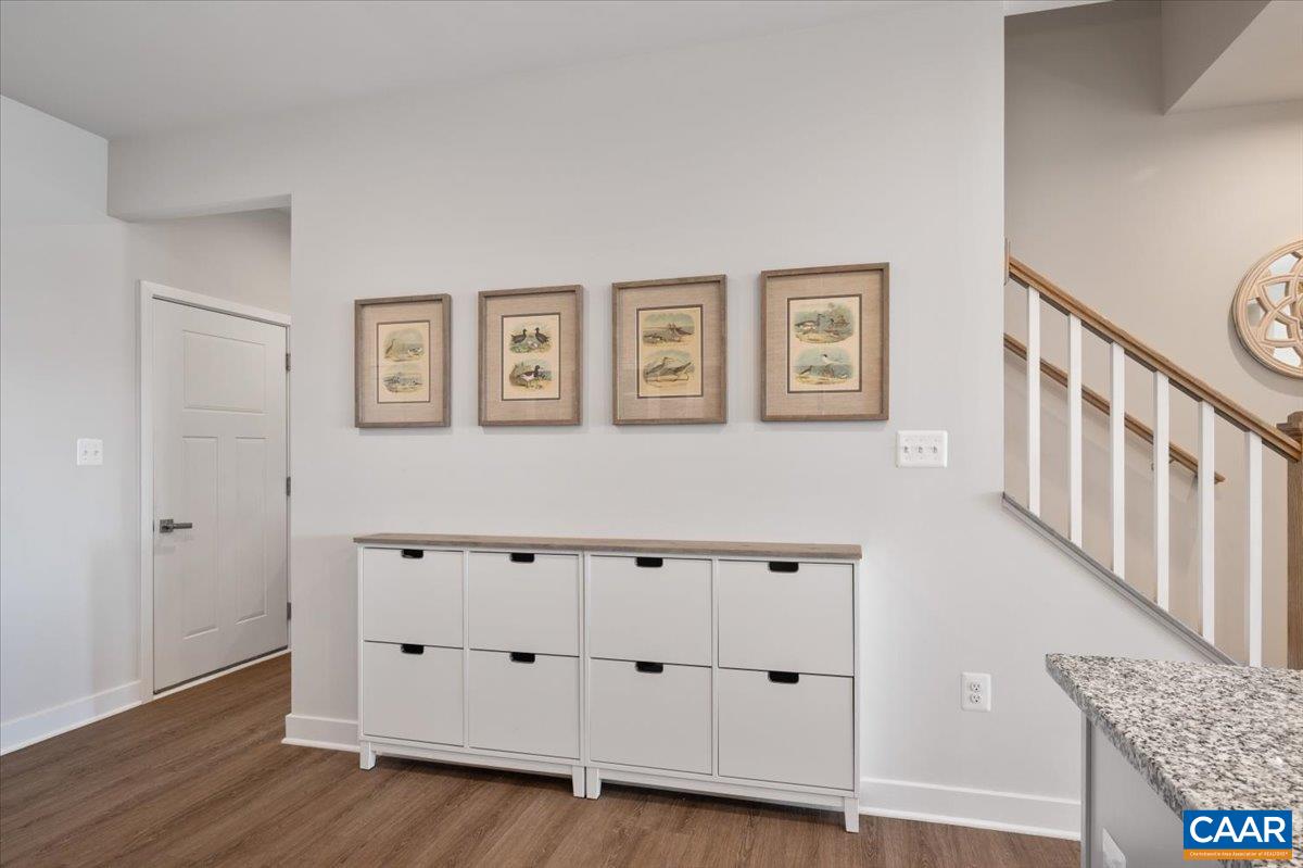 832 Swede Street Charlottesville, VA 22901 - Photo 12 of 57 a view of cabinets with wooden floor