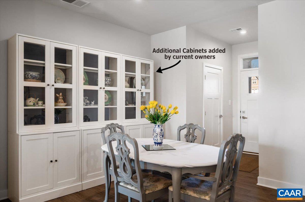 832 Swede Street Charlottesville, VA 22901 - Photo 4 of 57 a view of a dining room with furniture and chandelier