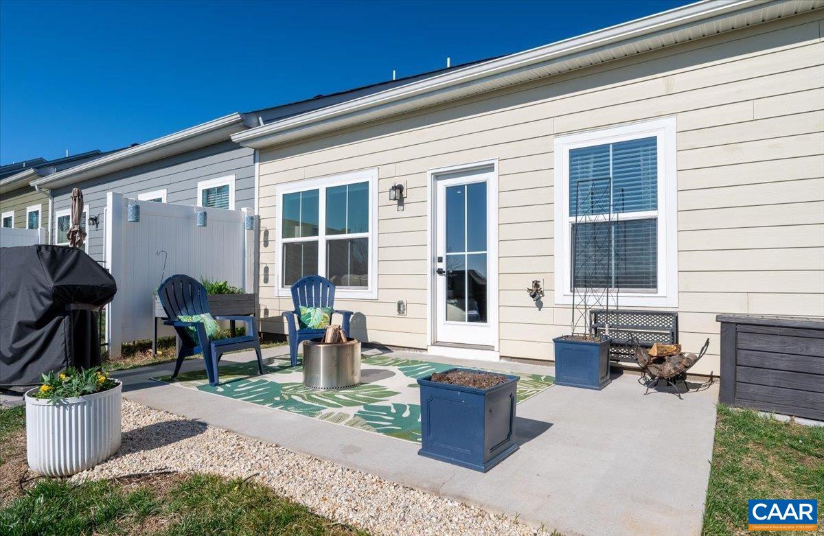 832 Swede Street Charlottesville, VA 22901 - Photo 45 of 57 a view of a house with backyard and sitting area
