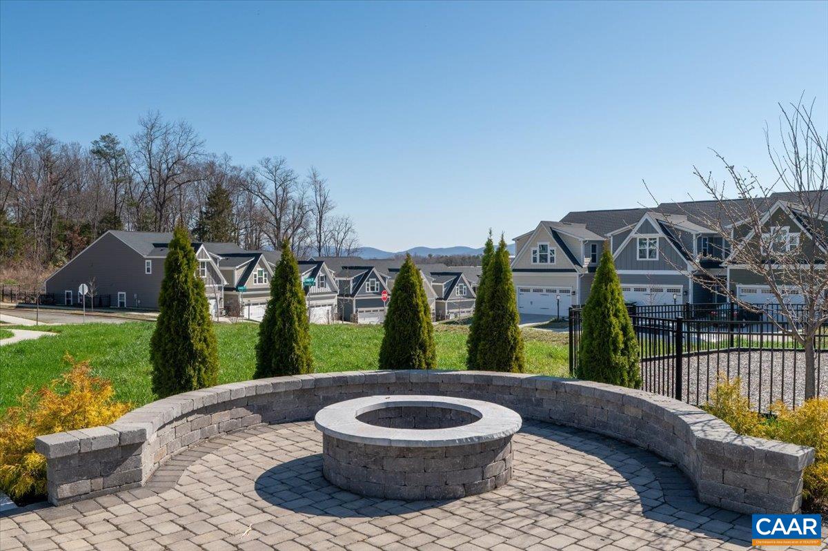832 Swede Street Charlottesville, VA 22901 - Photo 49 of 57 a view of a porch with furniture and a yard