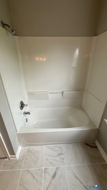1424 Decatur Street Richmond, VA 23224 - Photo 22 of 28 Bathtub and shower combination with chrome fixture