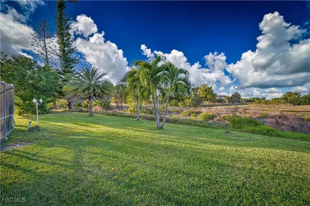 a view of a golf course with a fountain