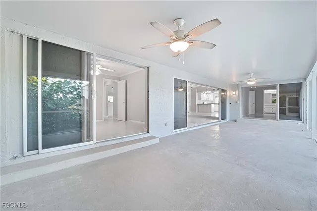 a view of a livingroom with a large window