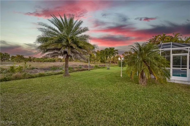 a view of a yard with a house