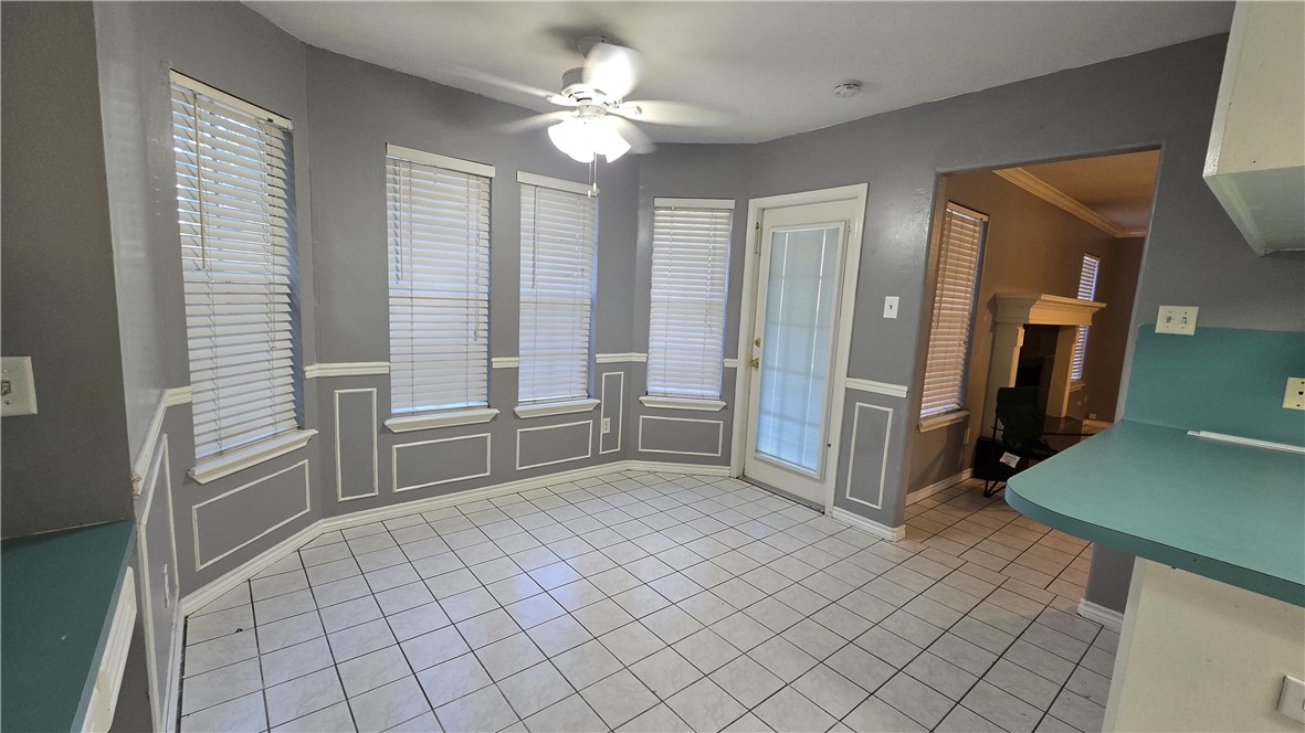 5026 Rasputin Court Corpus Christi, TX 78413 - Photo 14 of 40 a view of an empty room with a fireplace