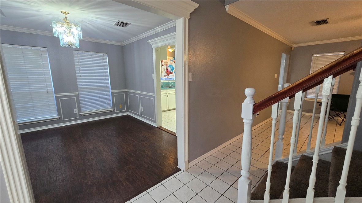 5026 Rasputin Court Corpus Christi, TX 78413 - Photo 9 of 40 a view of a livingroom with wooden floor and stairs