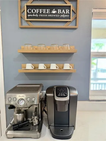 a view of storage and utility room with washer and dryer
