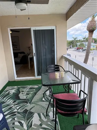 a room with furniture and a rug