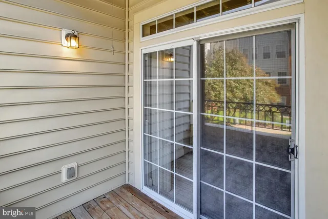 a view of a large building from a balcony