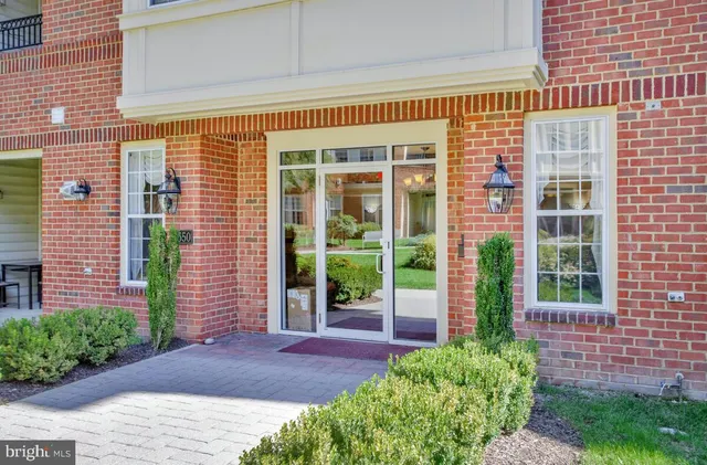 a view of a door and a window