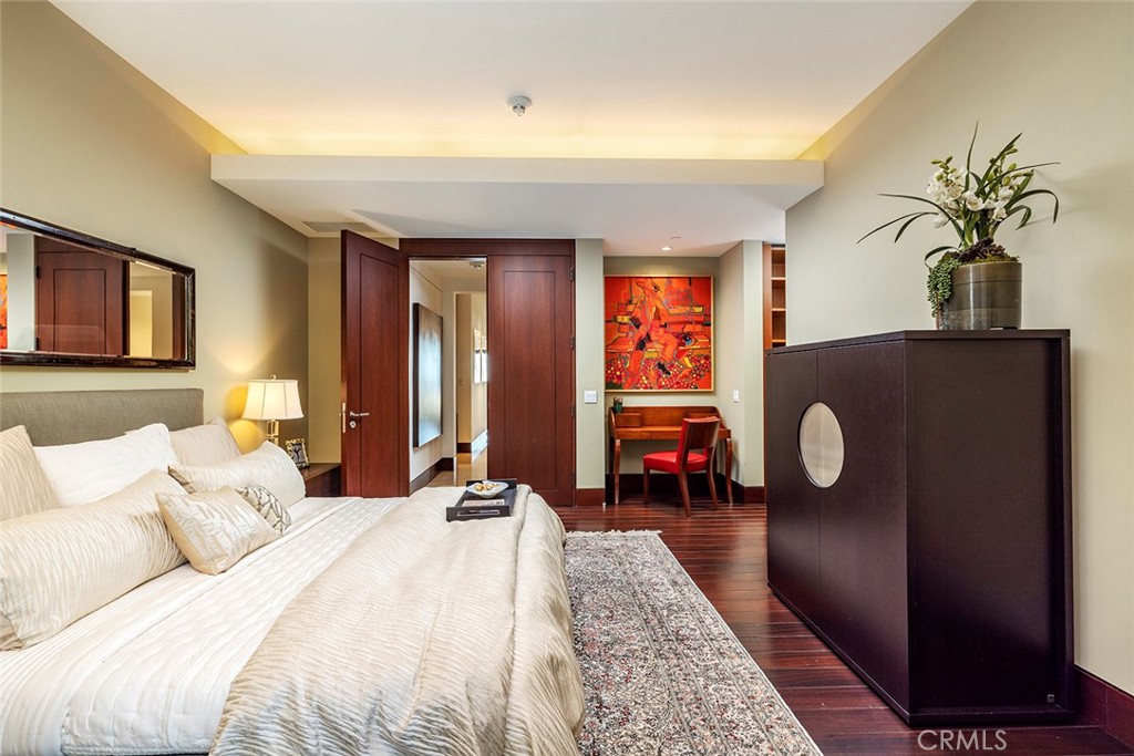 9 Sailcrest Newport Coast, CA 92657 - Photo 23 of 37 a bedroom with a bed and dresser with mirror