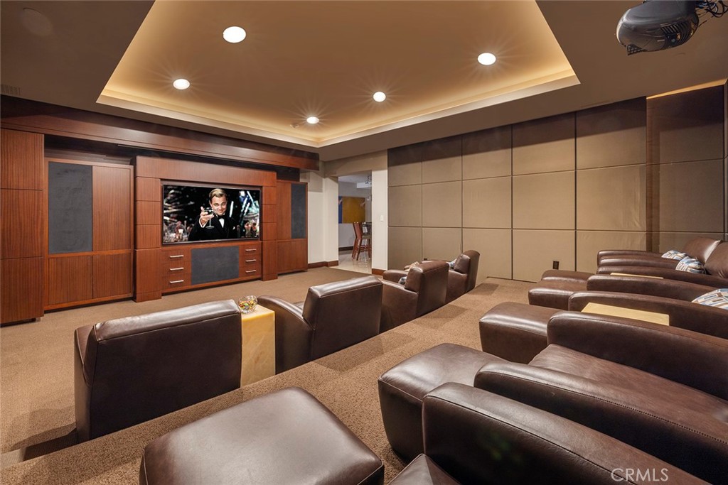 9 Sailcrest Newport Coast, CA 92657 - Photo 29 of 37 a media room with lots of chairs and a projector screen