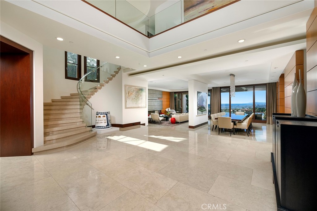 9 Sailcrest Newport Coast, CA 92657 - Photo 4 of 37 a living room with furniture and a large window