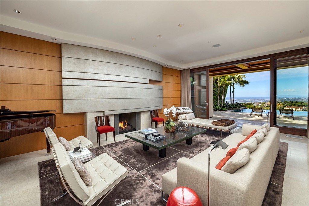 9 Sailcrest Newport Coast, CA 92657 - Photo 7 of 37 a living room with furniture and a floor to ceiling window