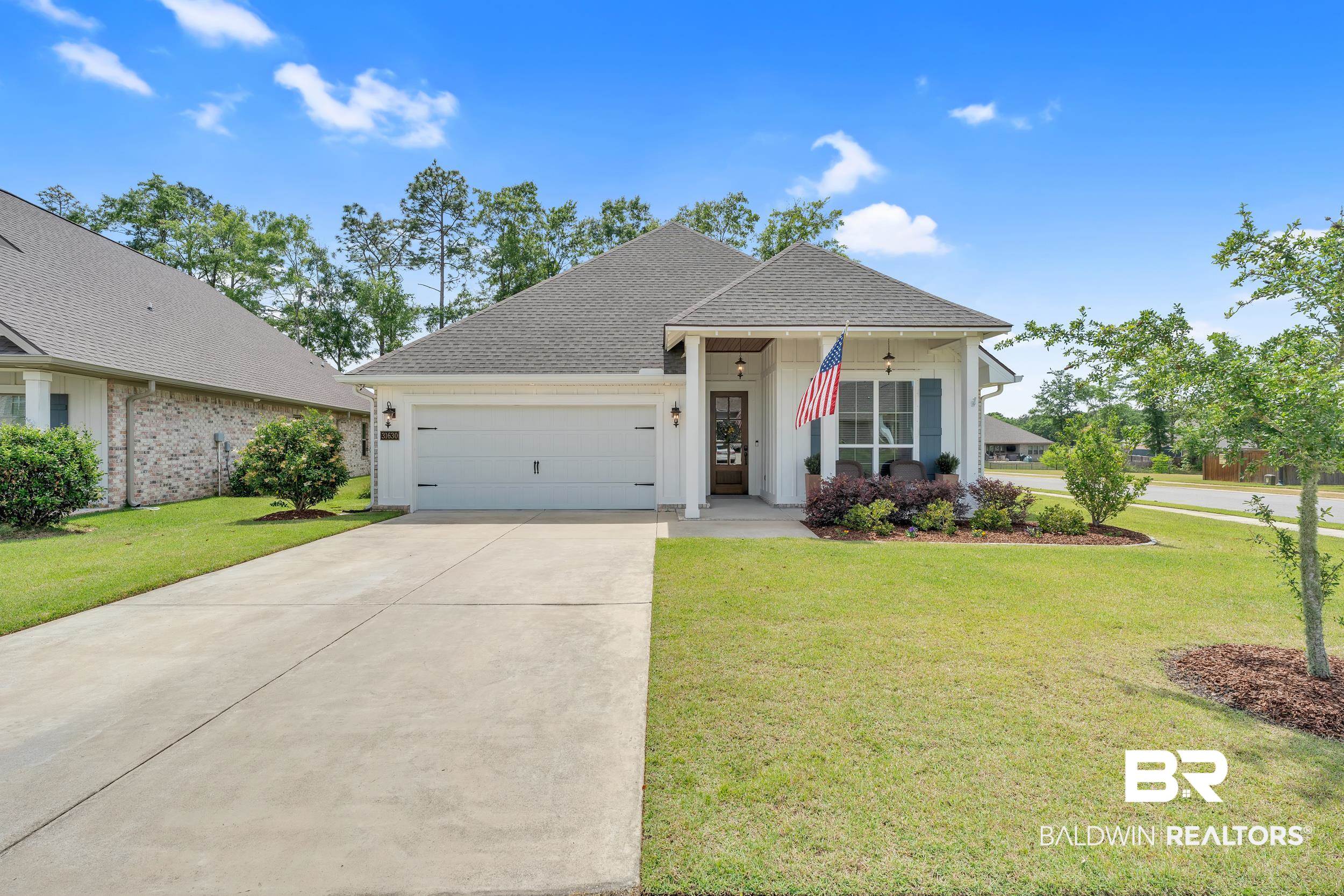 31630 Canopy Loop Daphne, AL 36527 - Photo 26 of 30 Ranch-style home with a garage, roof with shingles, a front yard, and concrete driveway