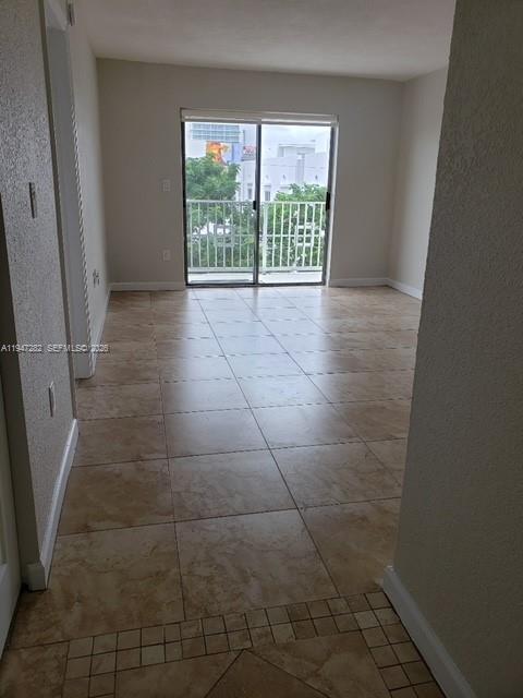 445 Southwest 11th Street, Unit 404 Miami, FL 33130 - Photo 12 of 13 a view of a hallway