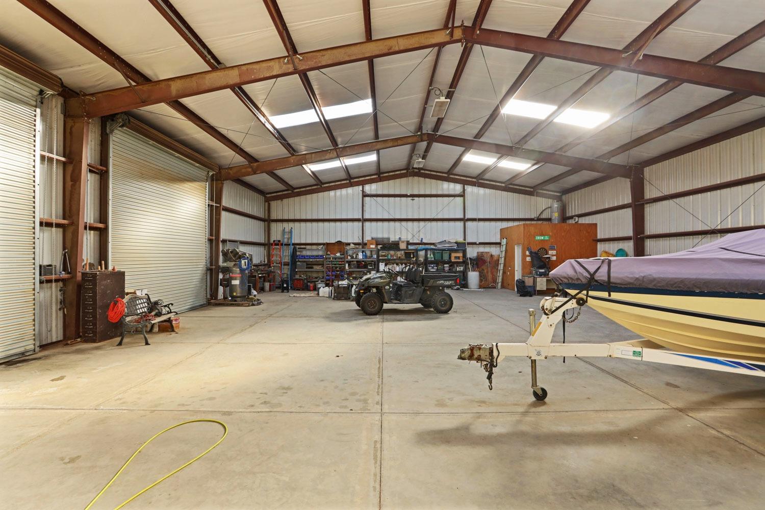 10393 Bradbury Road Ballico, CA 95303 - Photo 81 of 85 a view of a room with gym equipment