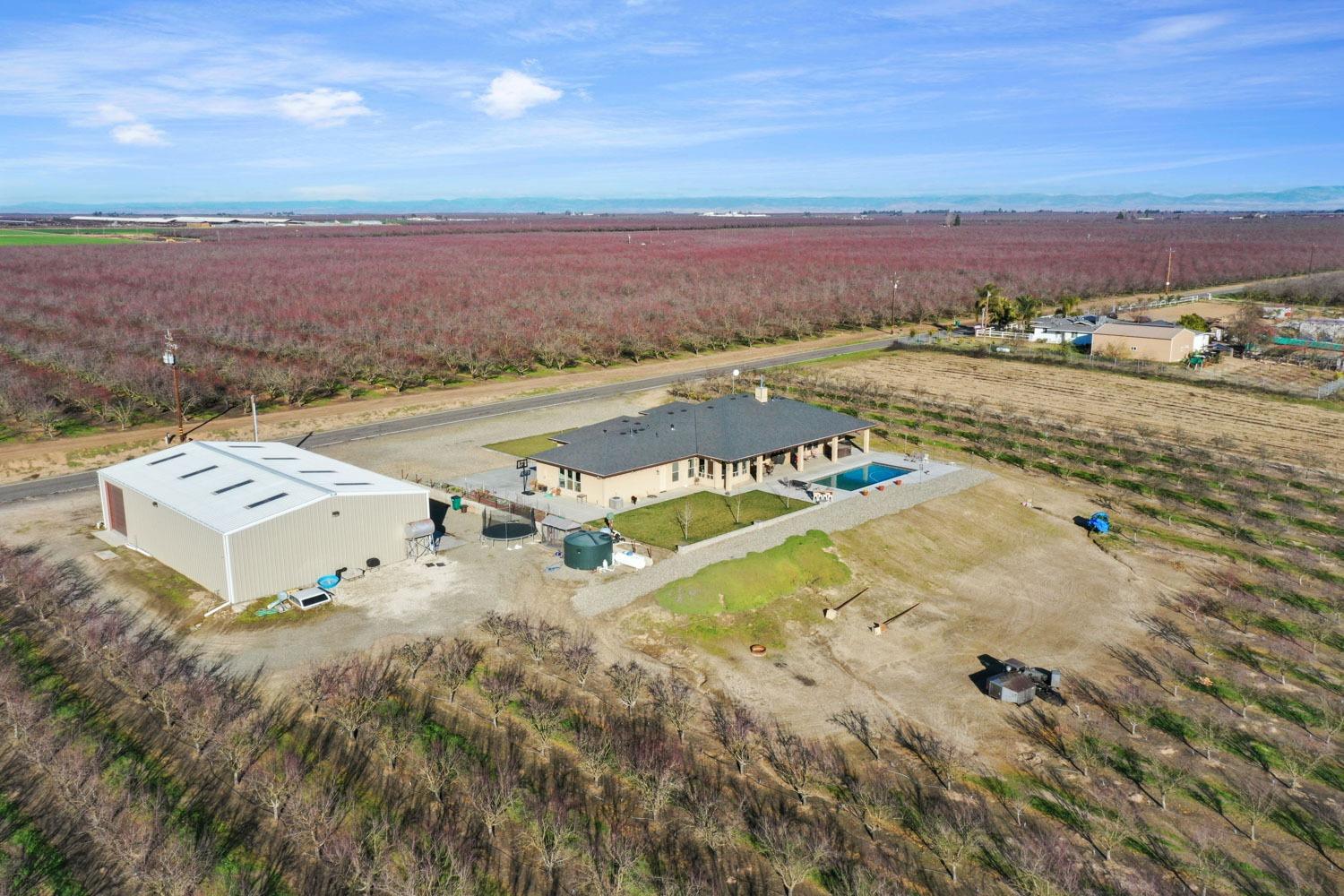 10393 Bradbury Road Ballico, CA 95303 - Photo 10 of 85 an aerial view of residential houses with outdoor space