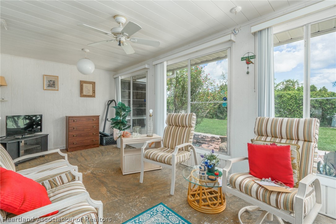 4722 Granada Boulevard Sebring, FL 33872 - Photo 11 of 11 a living room with furniture and a large window