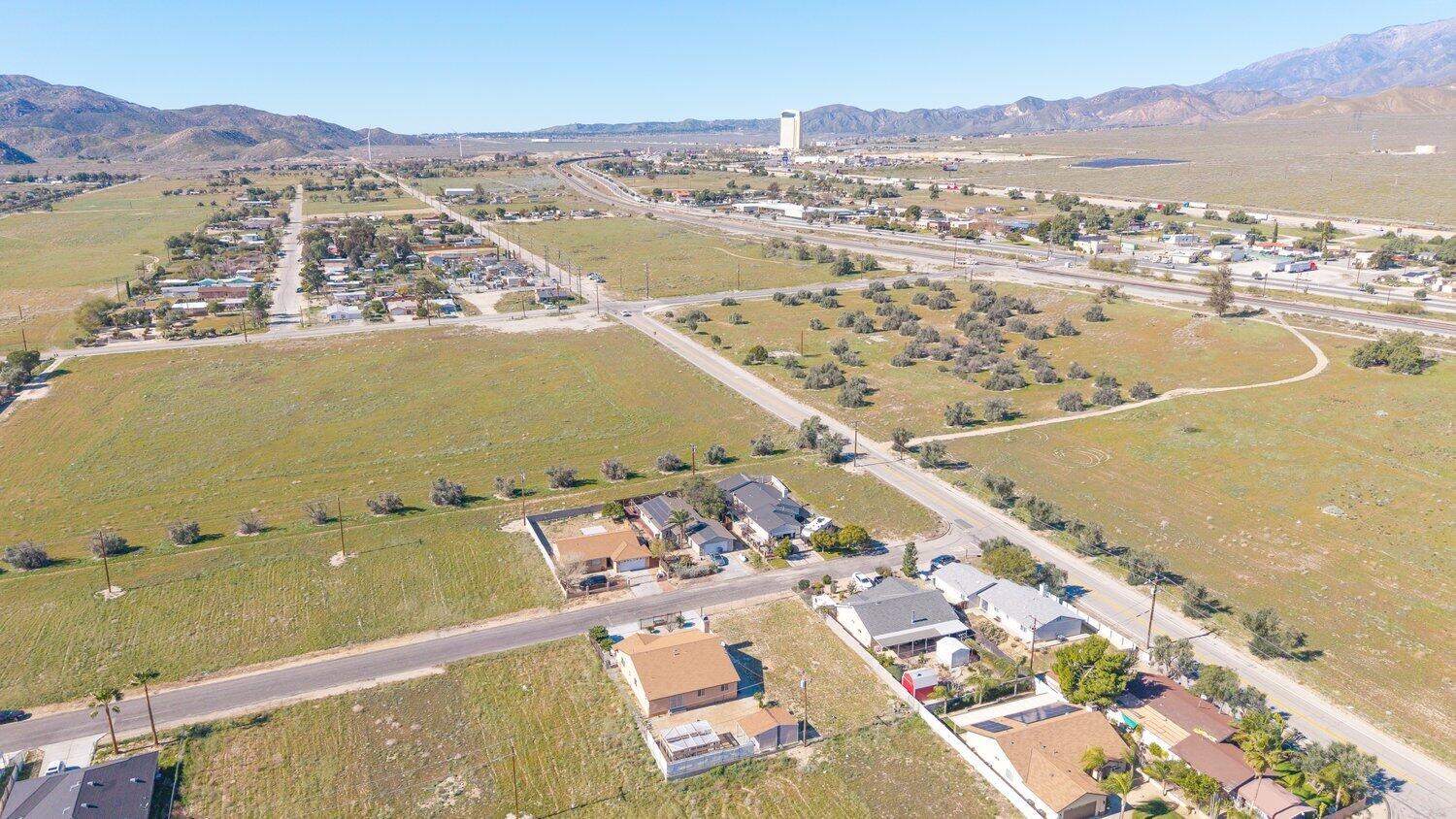 14280 Rafael Street Cabazon, CA 92230 - Photo 7 of 9 an aerial view of lake and residential houses