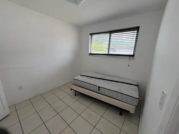 a view of a room with exposed radiator