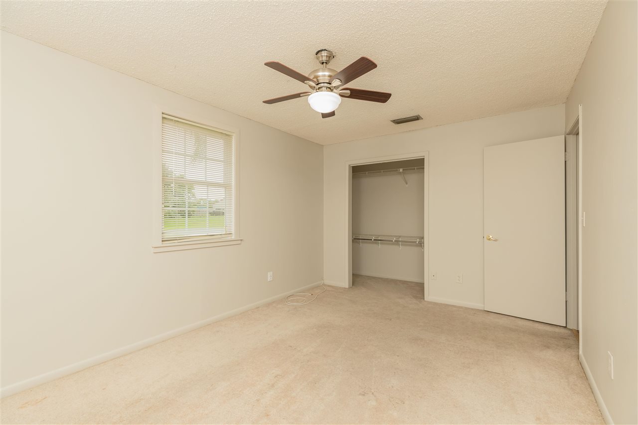 233 Cornell Road St. Augustine, FL 32086 - Photo 11 of 35 a view of a livingroom with a ceiling fan and window