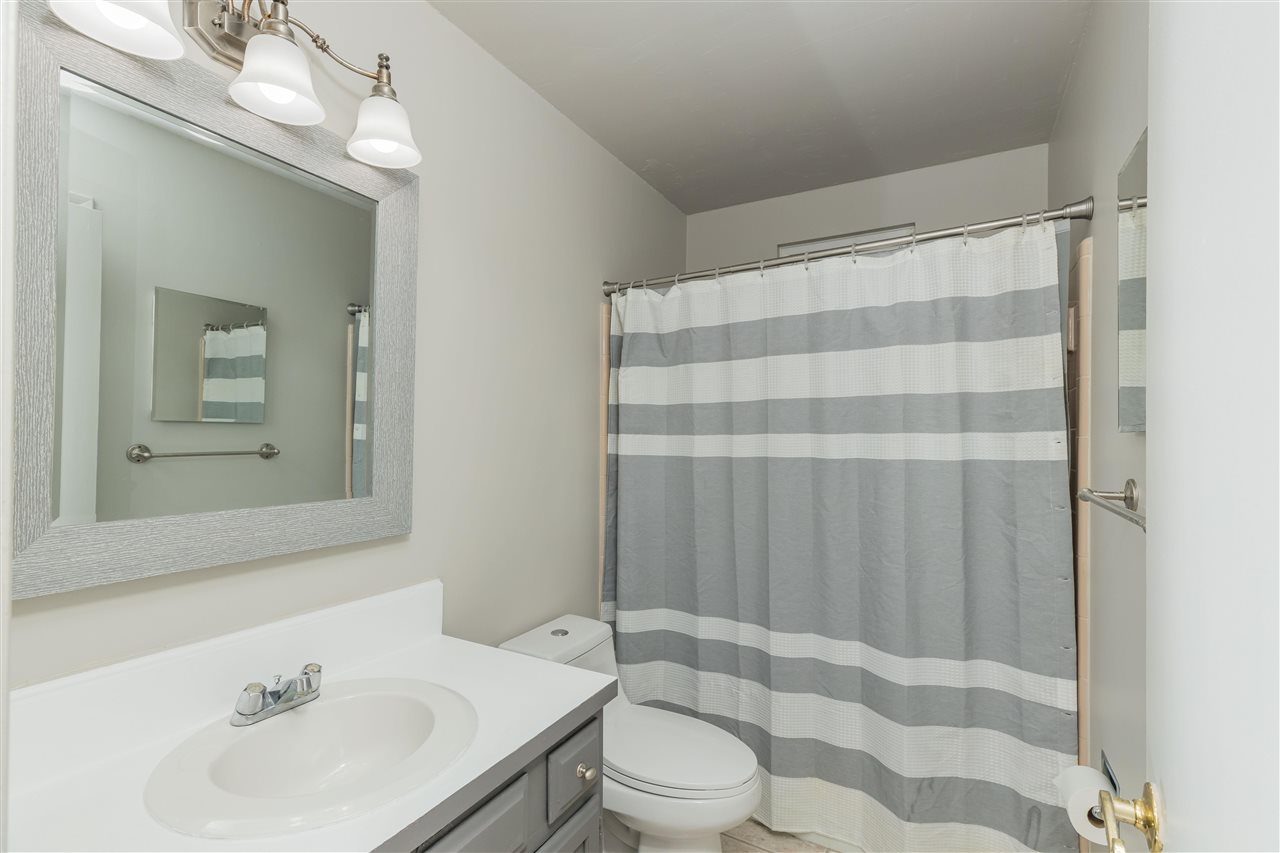 233 Cornell Road St. Augustine, FL 32086 - Photo 15 of 35 a bathroom with a sink toilet and shower