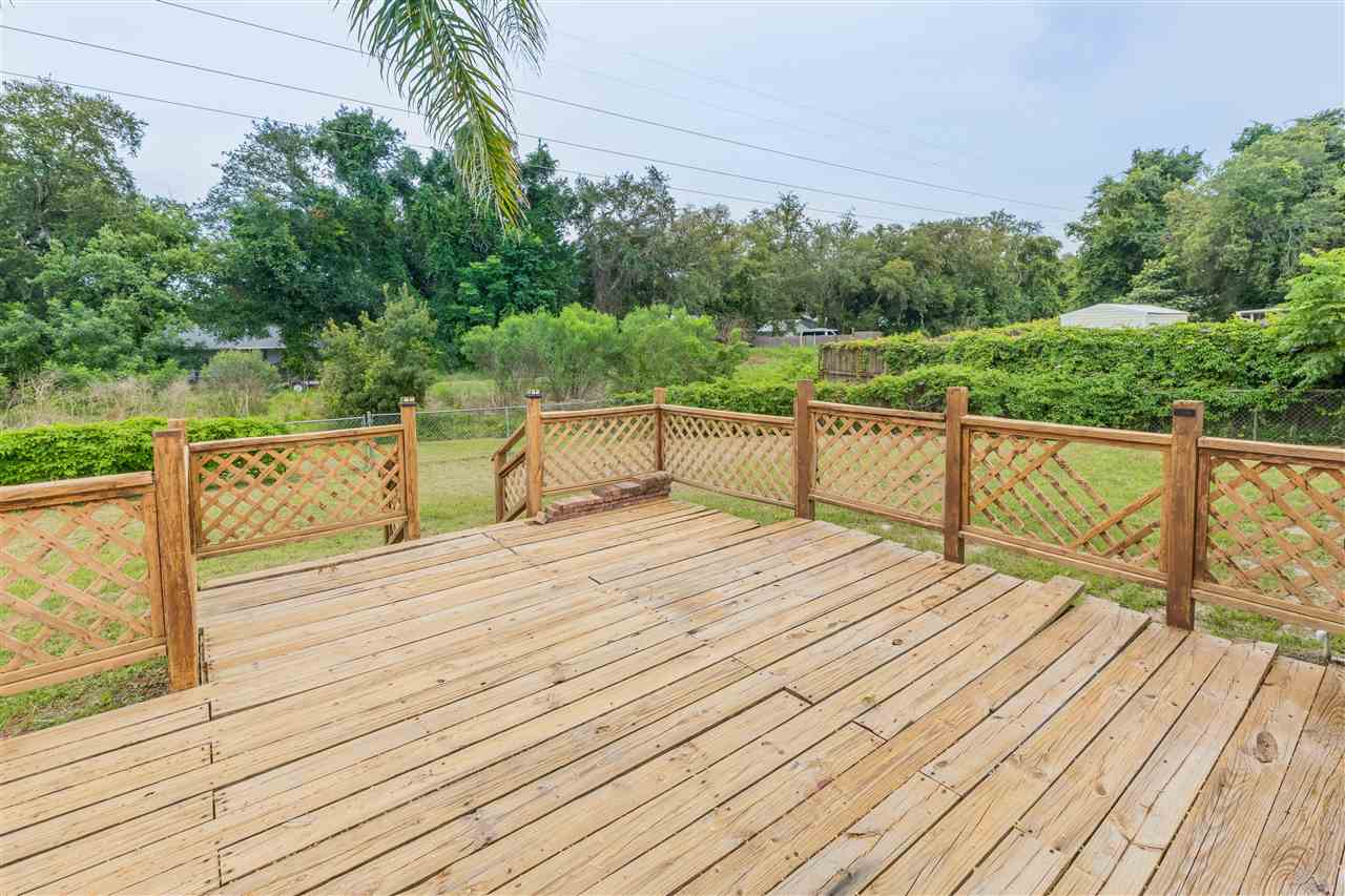 233 Cornell Road St. Augustine, FL 32086 - Photo 17 of 35 a view of outdoor space with deck and yard