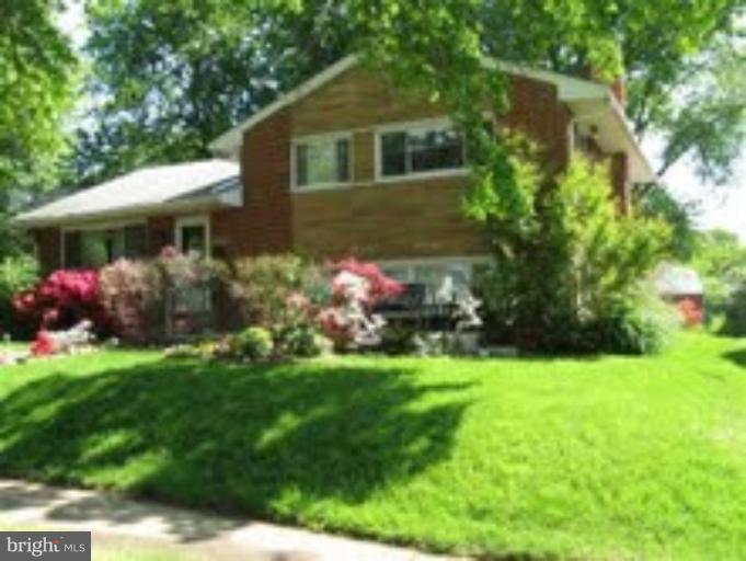 10225 Conover Drive Silver Spring, MD 20902 - Photo 1 of 1 a front view of house with yard