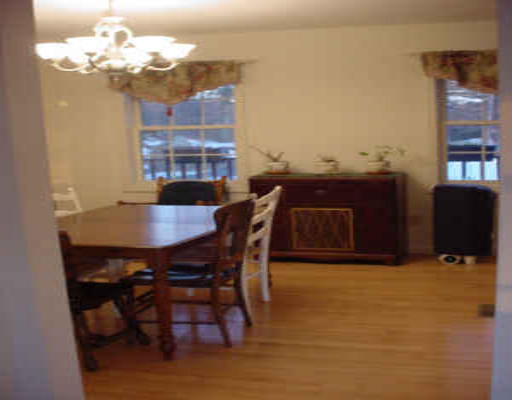 1138 Reed Street Warren, MA 01092 - Photo 6 of 7 a view of a dining room with furniture and chandelier