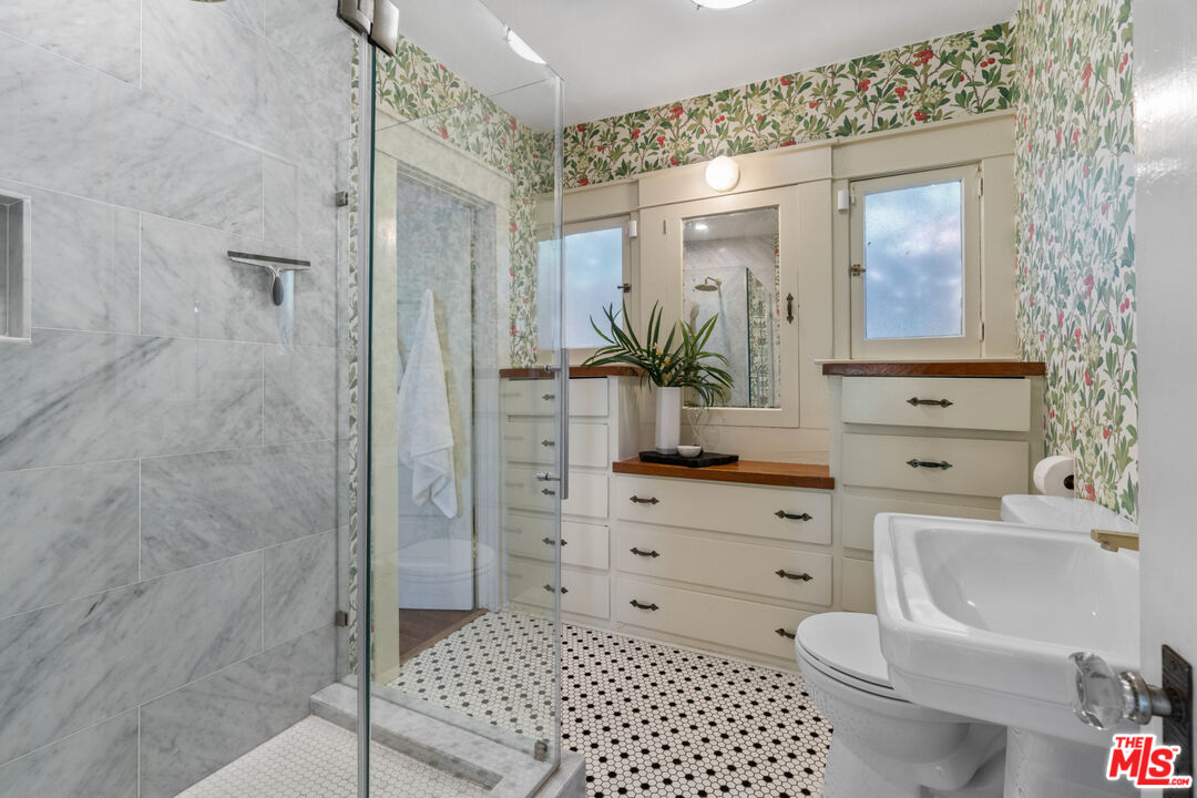 6157 Springvale Drive Los Angeles, CA 90042 - Photo 13 of 21 a bathroom with a sink a toilet and shower