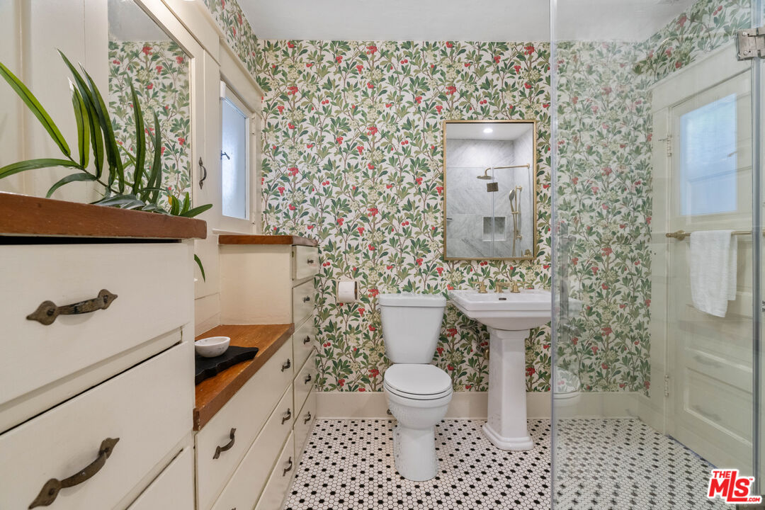 6157 Springvale Drive Los Angeles, CA 90042 - Photo 14 of 21 a bathroom with a sink toilet and shower