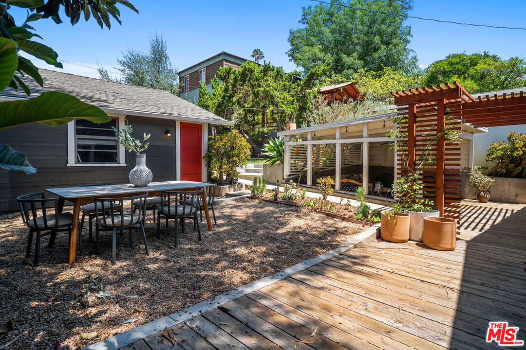 6157 Springvale Drive Los Angeles, CA 90042 - Photo 18 of 21 a view of a house with backyard and sitting area