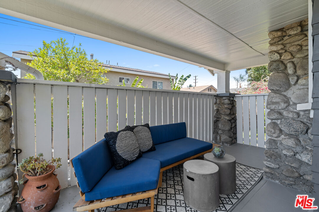 6157 Springvale Drive Los Angeles, CA 90042 - Photo 2 of 21 a living room with furniture and a potted plant