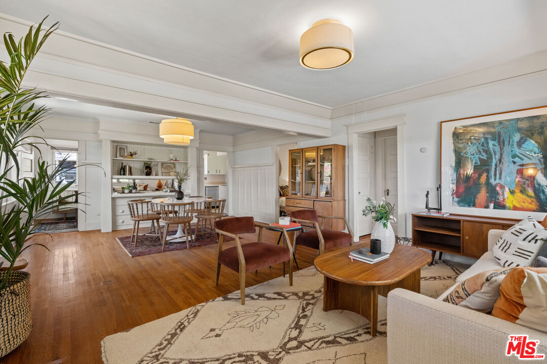 6157 Springvale Drive Los Angeles, CA 90042 - Photo 4 of 21 a living room with furniture and painting on the wall