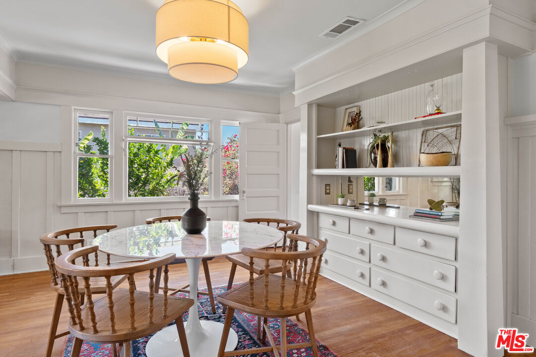 6157 Springvale Drive Los Angeles, CA 90042 - Photo 6 of 21 a dining room with furniture and window