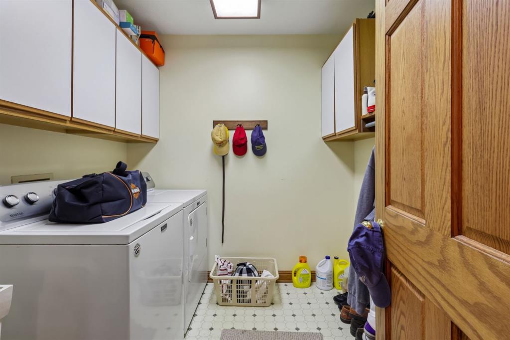 301 Romain Road Pulaski, PA 16143 - Photo 33 of 49 the laundry room is spacious and has a laundry sink and washer and dryer are included