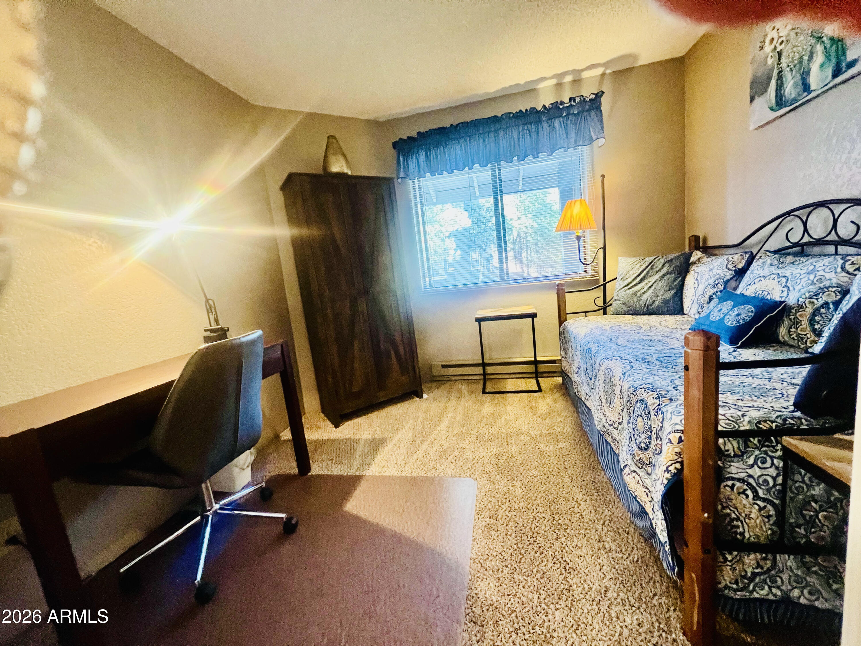 2700 South White Mountain Road, Unit 1126 Show Low, AZ 85901 - Photo 21 of 32 a view of a kitchen with fridge and windows