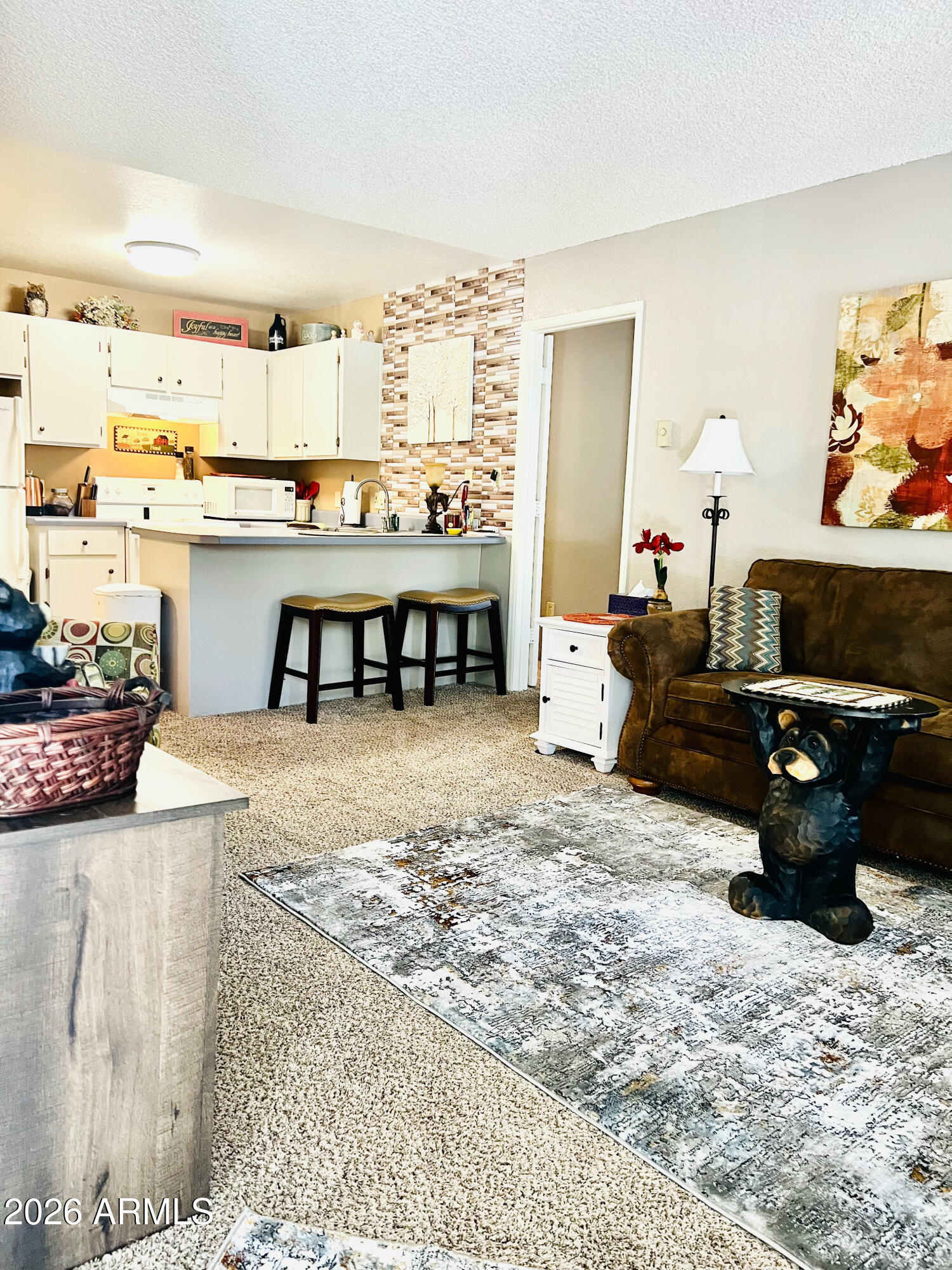 2700 South White Mountain Road, Unit 1126 Show Low, AZ 85901 - Photo 3 of 32 a living room with furniture