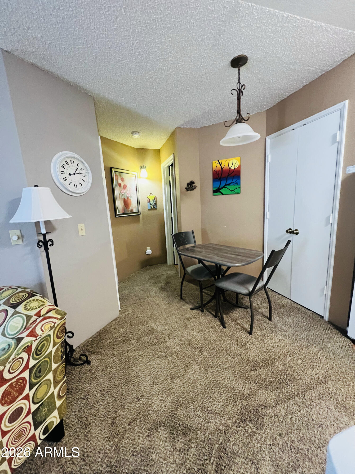 2700 South White Mountain Road, Unit 1126 Show Low, AZ 85901 - Photo 31 of 32 a living room with furniture and a window