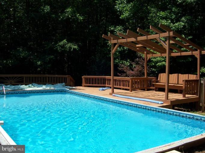 29 Garretts Mill Road Mineral, VA 23117 - Photo 32 of 32 Inground Pool with deck surround and Pergola