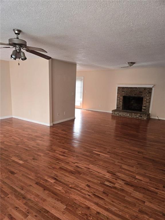3704 Bolding Road Flowery Branch, GA 30542 - Photo 3 of 10 wooden floor in an empty room with a window