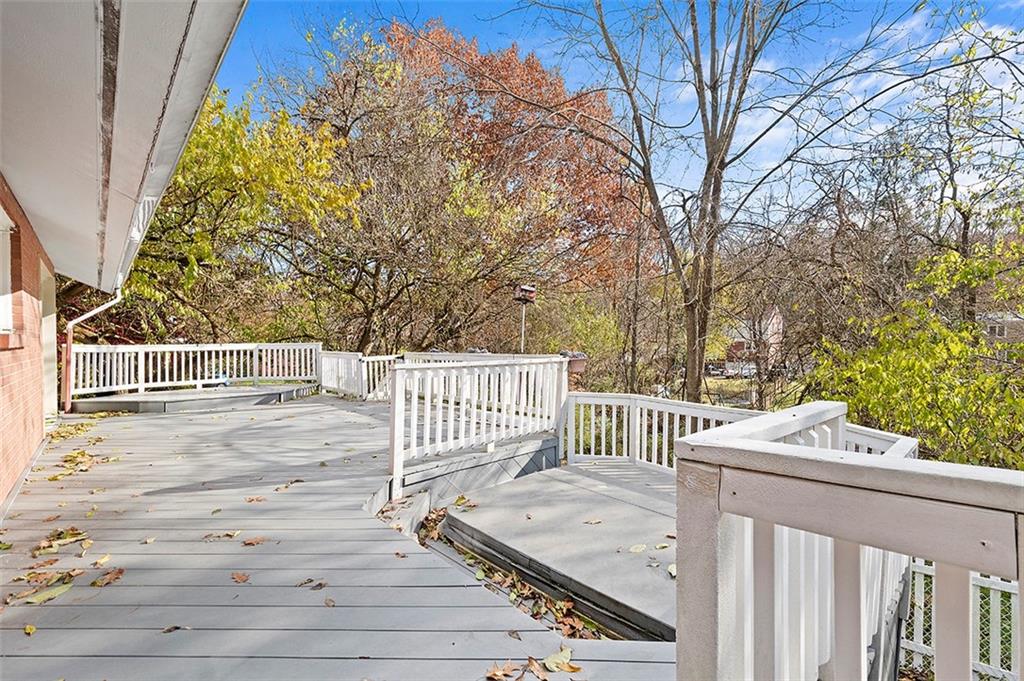 801 Elm Spring Road Pittsburgh, PA 15243 - Photo 21 of 25 a view of a wooden deck and a backyard