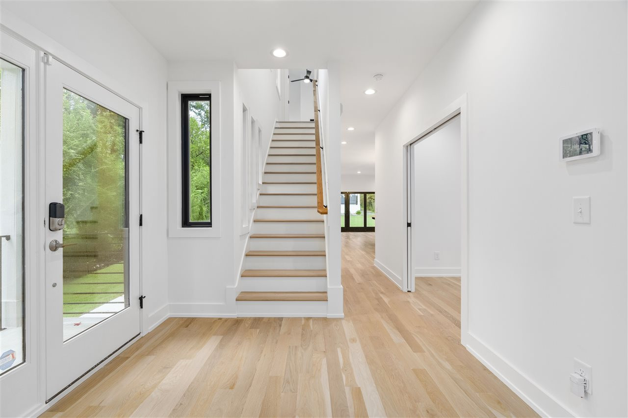 1600 Glendale Avenue Durham, NC 27701 - Photo 14 of 29 a view of an entryway with wooden floor and windows
